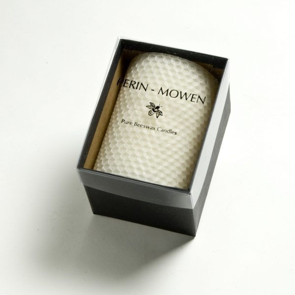 Hand rolled beeswax pillar 4 inches tall by 3 inches wide light beeswax