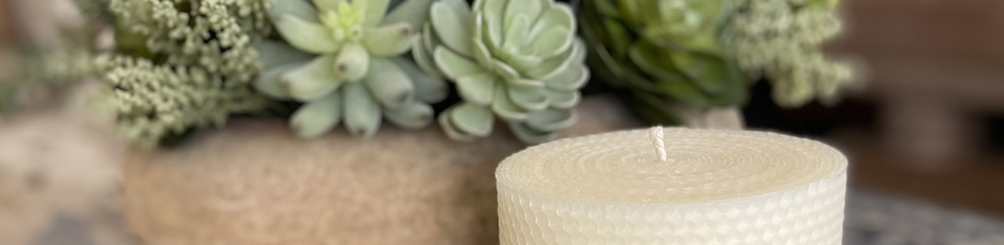 Light natural beeswax pillar candle